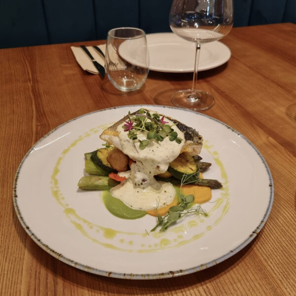 Sea bass with vegetables and pesto sauce
