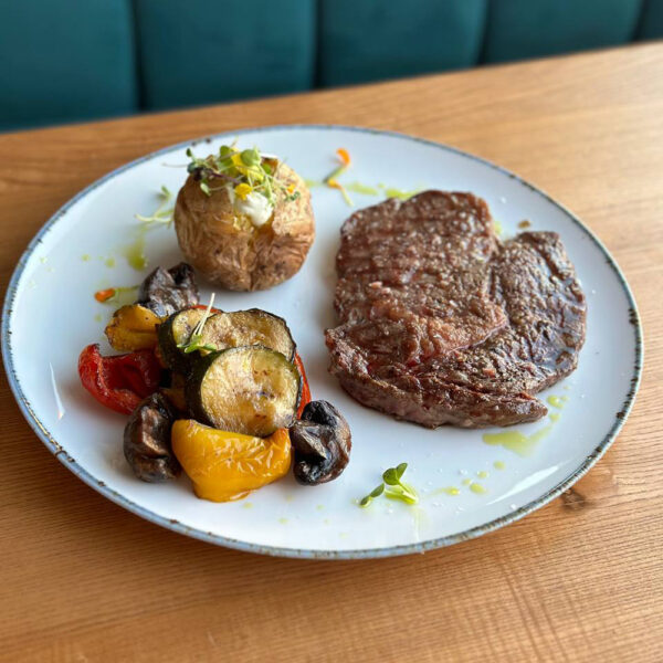 Ribeye with grilled vegetables & baked potato